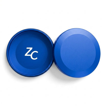 Z Caddy metal pouch can in blue, lid and base shown separated from above
