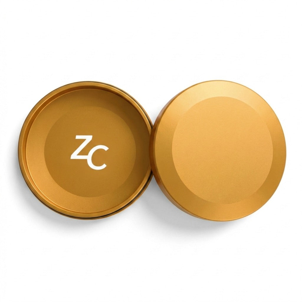 Z Caddy metal pouch can in gold, lid and base shown separated from above
