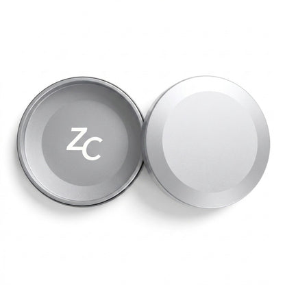 Z Caddy metal pouch can in silver, lid and base shown separated from above