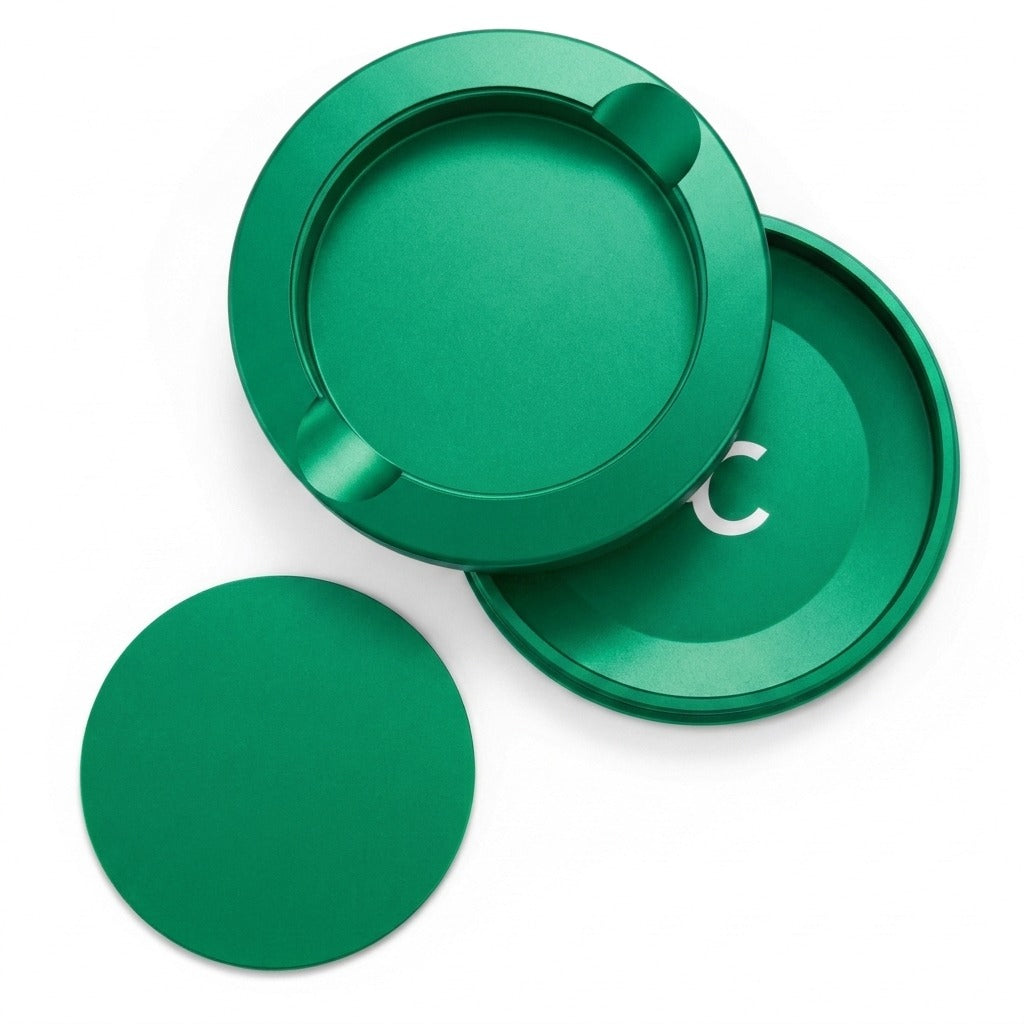 Z Caddy metal pouch can in green, lid, disposal chamber and base shown separated from above