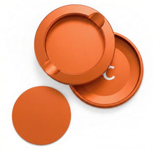 Z Caddy metal pouch can in orange, lid, disposal chamber and base shown separated from above
