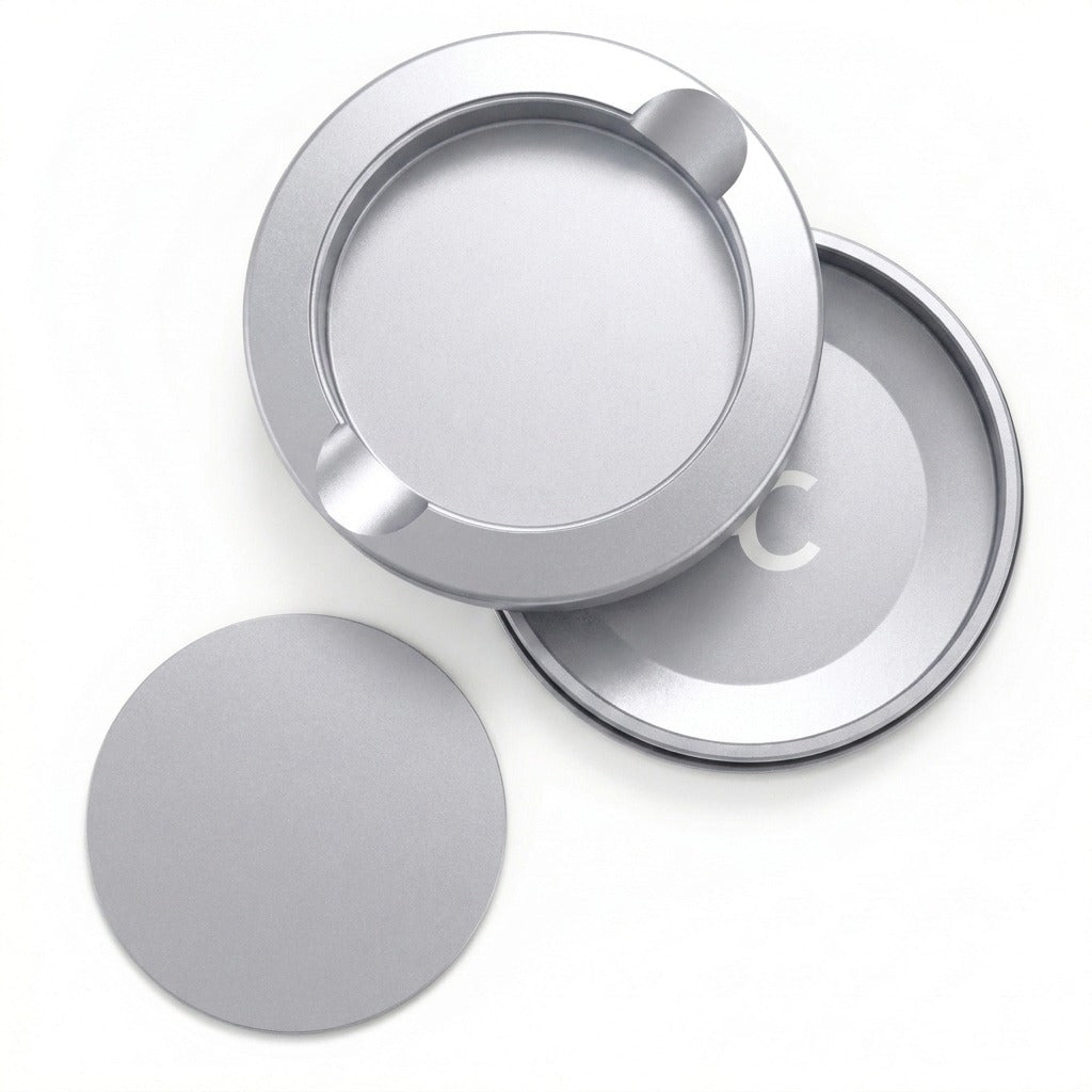 Z Caddy metal pouch can in silver, lid, disposal chamber and base shown separated from above