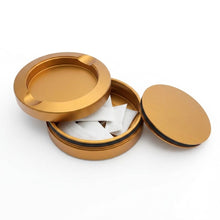 Z Caddy OG metal pouch can in gold, open with pouches in the storage chamber