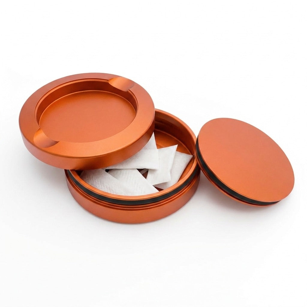 Z Caddy OG metal pouch can in orange, open with pouches in the storage chamber