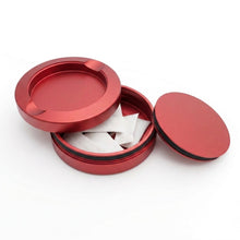 Z Caddy OG metal pouch can in red, open with pouches in the storage chamber